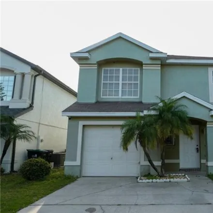 Rent this 4 bed house on 13234 Ashington Pointe Drive in Meadow Woods, Orange County