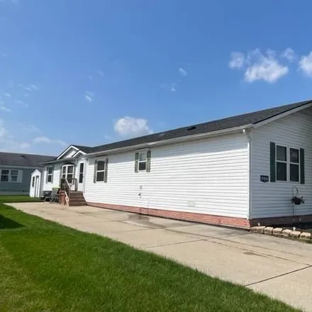 Buy this studio apartment on 46078 Morceau Drive in Macomb Township, MI 48044