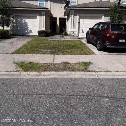 Rent this 2 bed townhouse on 4762 Playpen Drive in North Oak Hill, Jacksonville
