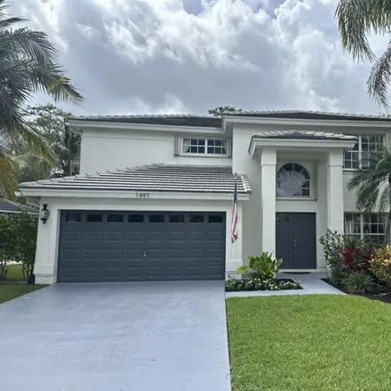 Buy this 4 bed house on 1497 S Club Dr in Wellington, Florida