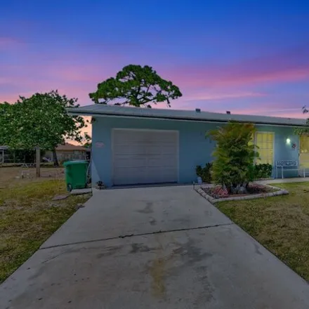 Buy this 3 bed house on 1058 Southeast Proctor Lane in Port Saint Lucie, FL 34983