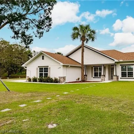 Rent this 4 bed house on 1898 Werner Drive in Olga, Lee County