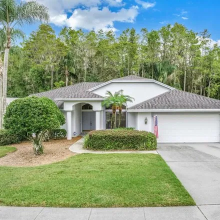 Buy this 4 bed house on 2521 Centerwood Drive in East Lake, FL 34688