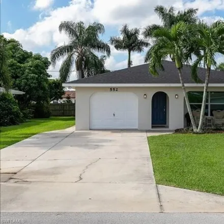 Rent this 3 bed house on 552 105th Ave N in Naples, Florida