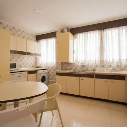 Rent this 7 bed apartment on Plaça de Sant Agustí in Valencia, Spain