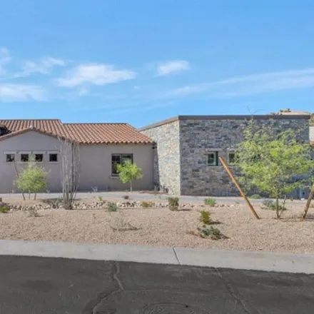 Buy this 4 bed house on 10779 E Whitethorn Dr in Scottsdale, Arizona