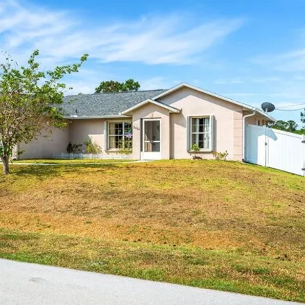 Buy this 3 bed house on 2067 Thisbe Avenue Southeast in Palm Bay, FL 32909