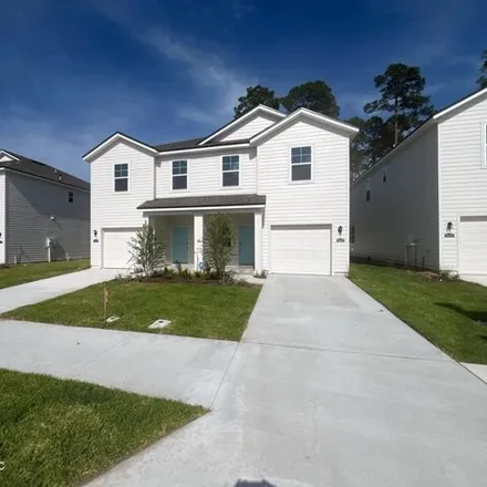 Buy this 3 bed house on 14478 Macadamia Ln Unit 266 in Jacksonville, Florida