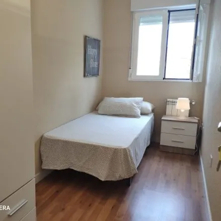 Rent this 2 bed room on Calle del Arroyo del Olivar in 43, 28018 Madrid