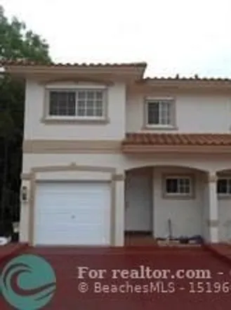 Rent this 3 bed house on Riverside Drive in Coral Springs, FL 33065