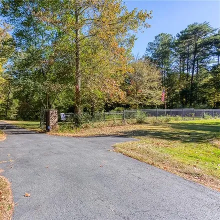 Buy this 3 bed house on 8459 Highway 92 in Woodstock, GA 30189