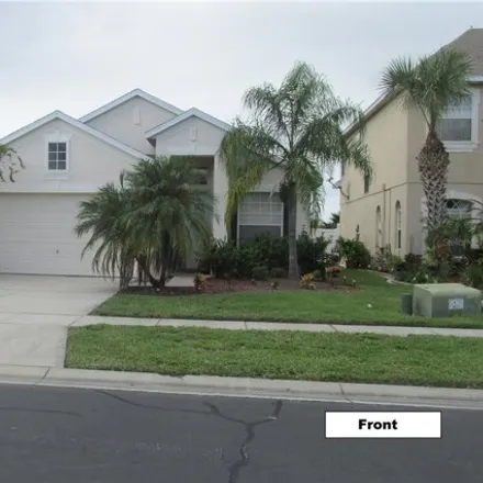 Rent this 3 bed house on 14524 Huntcliff Park Way in Meadow Woods, Orange County