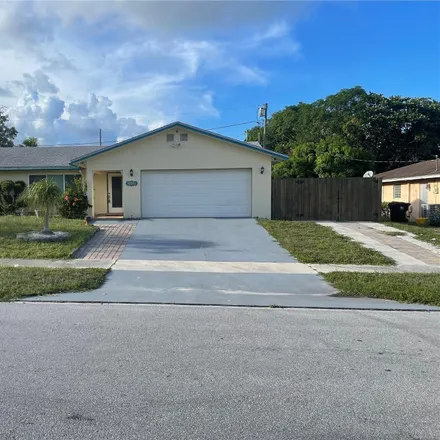 Rent this 3 bed house on 2014 7th Court South in Lake Worth Beach, FL 33461