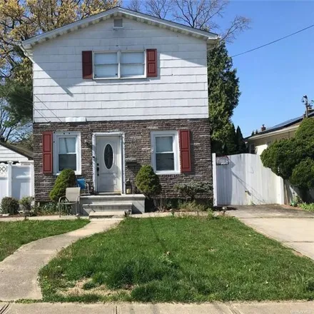 Buy this 4 bed house on 2466 8th Street in East Meadow, NY 11554