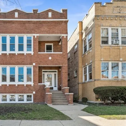 Buy this 6 bed house on 3324 North Springfield Avenue in Chicago, IL 60618