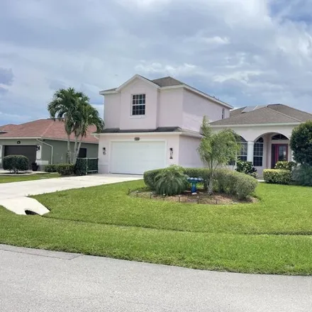 Buy this 5 bed house on 5898 Rose Petal Court in Port Saint Lucie, FL 34986