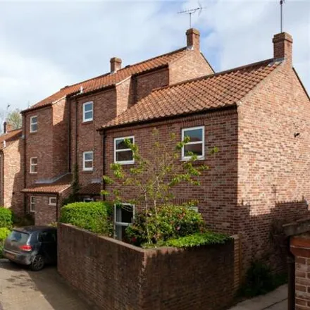 Buy this 2 bed townhouse on Pear Tree Court in York, YO1 7DF