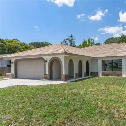 Buy this 4 bed house on 12171 Glancy Lane in Spring Hill, FL 34609