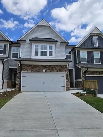 Rent this 3 bed townhouse on 898 Treadstone Overlook Northwest in Suwanee, GA 30024