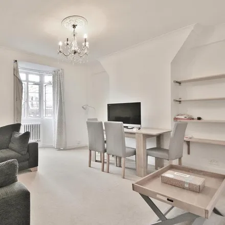 Rent this 4 bed apartment on Latymer Court in Hammersmith Road, London