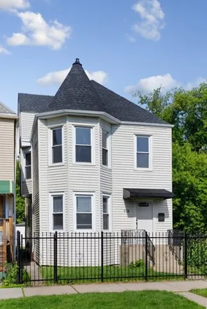 Buy this 6 bed house on 718 North Leamington Avenue in Chicago, IL 60651