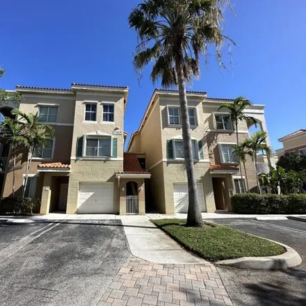 Buy this 2 bed condo on Legacy Boulevard in Monet, Palm Beach Gardens