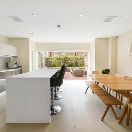 Rent this 5 bed townhouse on St Peter's Square in London, W6 0RX