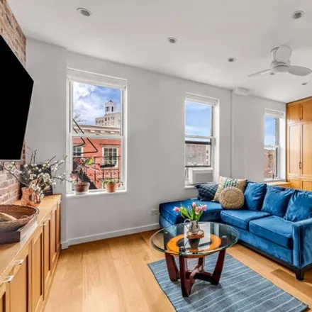 Buy this studio apartment on 64 MacDougal Street in New York, NY 10012