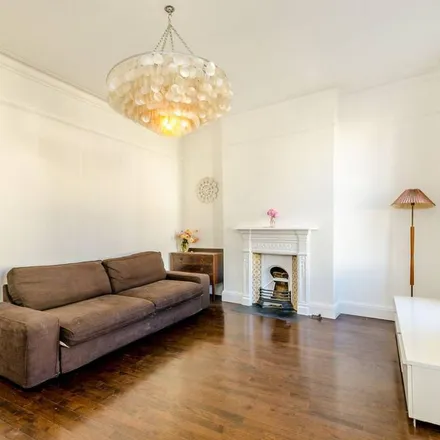 Rent this 2 bed apartment on Woodside in London, SW19 7AY
