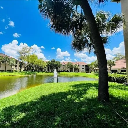 Rent this 3 bed house on 9166 West Atlantic Boulevard in Coral Springs, FL 33071