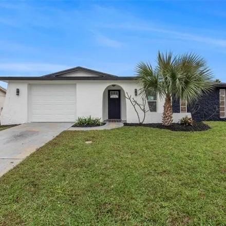 Buy this 2 bed house on 7999 Embassy Boulevard in Jasmine Estates, FL 34668