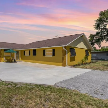 Buy this 4 bed house on 547 Timaquana Drive in Merritt Island, FL 32953