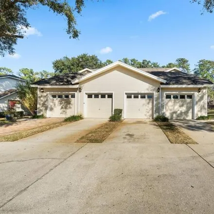 Buy this 2 bed house on Meadowbrook Golf Club in 3200 Northwest 98th Street, Gainesville