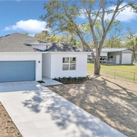 Buy this 4 bed house on 8596 Southeast 158th Place in Marion County, FL 34491