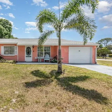 Buy this 3 bed house on 1316 Voyager Street Northeast in Palm Bay, FL 32905