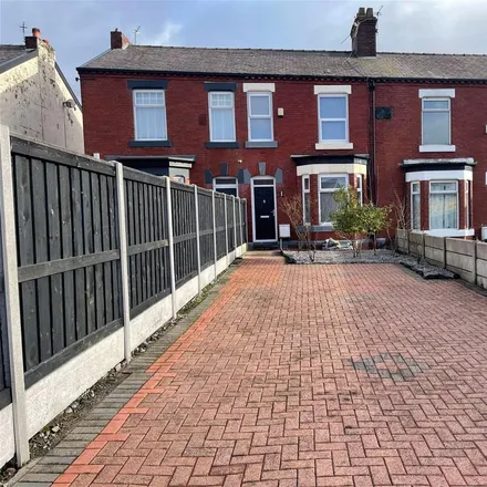 Rent this 3 bed townhouse on 156 Mossley Road in Ashton-under-Lyne, OL6 6LY