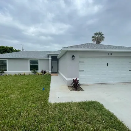Buy this 3 bed house on 1038 Northeast 13th Place in Cape Coral, FL 33909