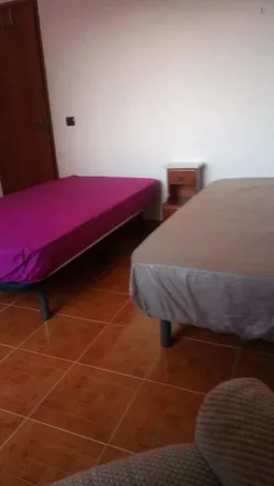 Rent this 3 bed room on Farmácia Solla in Avenida dos Cravos Vermelhos 9, Águas Livres