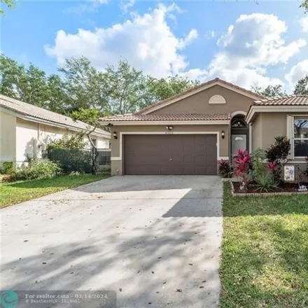 Buy this 3 bed house on Northwest 54th Avenue in Coconut Creek, FL 33073