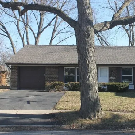 Buy this 4 bed house on 7701 Asbury Circle South in Hanover Park, Schaumburg Township