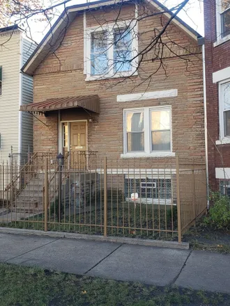 Buy this 6 bed duplex on 4141 West Arthington Street in Chicago, IL 60624