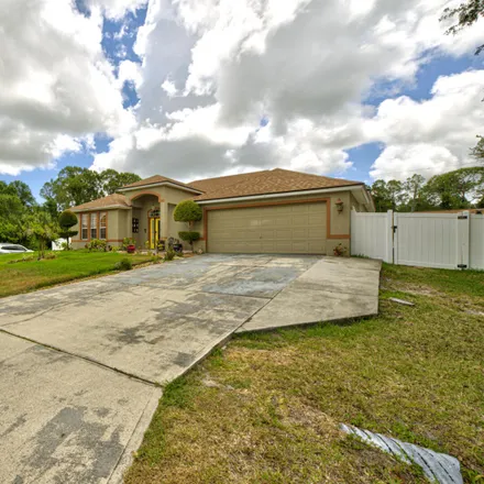 Image 5 - 1499 Tharp Road Southeast, Palm Bay, FL 32909, USA - House for sale