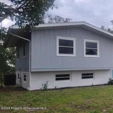 Rent this 3 bed house on 6182 Wayside Court in Spring Hill, FL 34606
