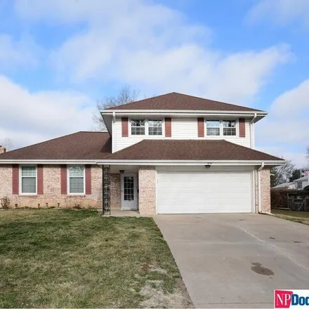 Buy this 4 bed house on 1746 Holling Drive in Omaha, NE 68144