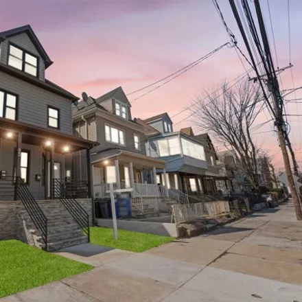 Buy this 8 bed house on 95 Claremont Avenue in West Bergen, Jersey City