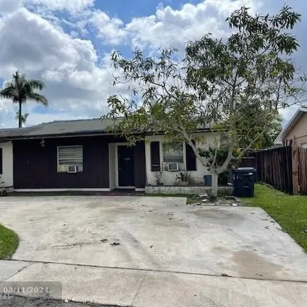 Buy this 4 bed house on 7686 Southwest 7th Street in North Lauderdale, FL 33068