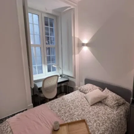 Rent this 7 bed room on Pensão Rossio in Rua dos Sapateiros 173, 1100-619 Lisbon