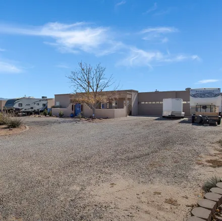 Buy this 4 bed house on 2408 Flagstone Road Northeast in Rio Rancho, NM 87124