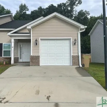 Rent this 3 bed house on 186 Turtle Drive in Richmond Hill, GA 31324