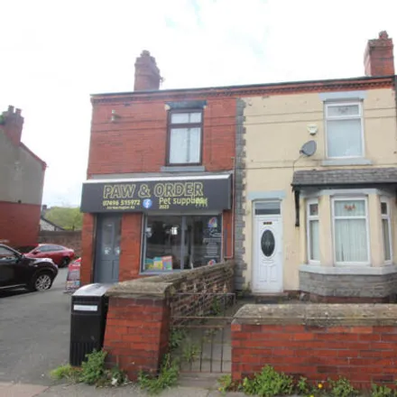 Buy this 2 bed townhouse on Warrington Road/Tyrer Avenue in Warrington Road, Wigan